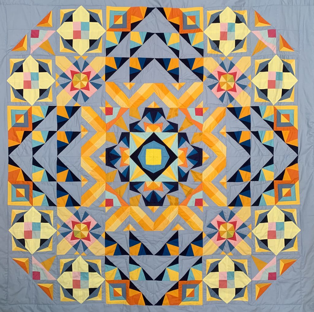 Großer Quilt aus Halbquadrat-Dreiecken.